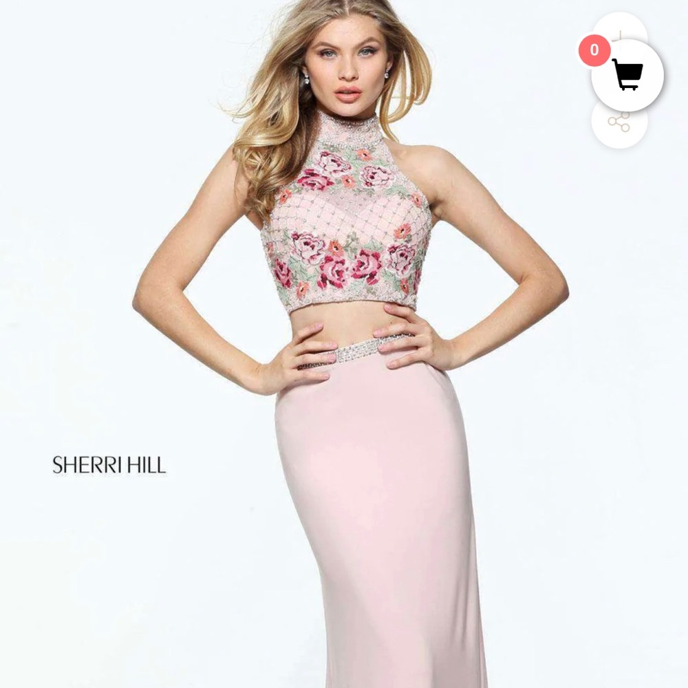 In almost brand new condition blush and Australian Crystal pearl dress.